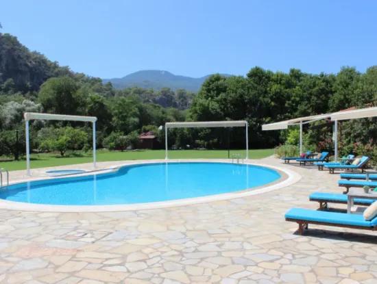 Dalyan Villa Candurmaz. Dalyan Nehri Kenarında Büyük Havuzlu Villalar.